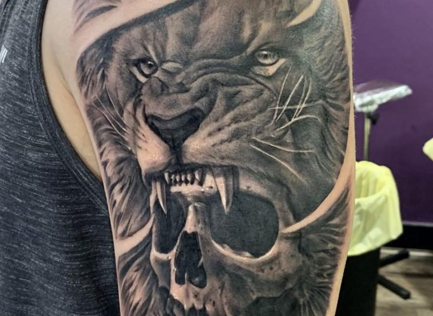 Lion/Skull Tattoo | Tribal Lion Tattoo, Mens Lion Tattoo, Lion Tattoo