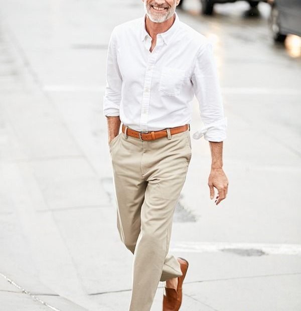 Khaki Pants And A White Button-Up Shirt Are An Iconic Menswear Combination.  What Keeps This Look Fresh Instea… | Pants Outfit Men, Mens Outfits, Mens  Fashion Casual