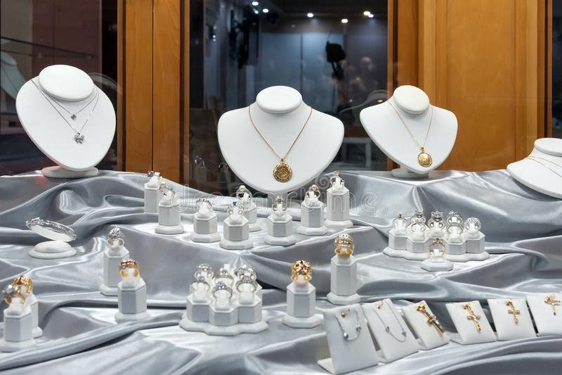 Jewelry Diamond Rings And Necklaces Show In Luxury Retail Store Window  Display Showcase Stock Photo - Image Of Light, Concept: 142397004
